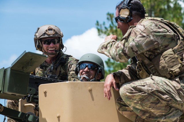 Combating crime on agenda as partners tour Florida National Guard facility
