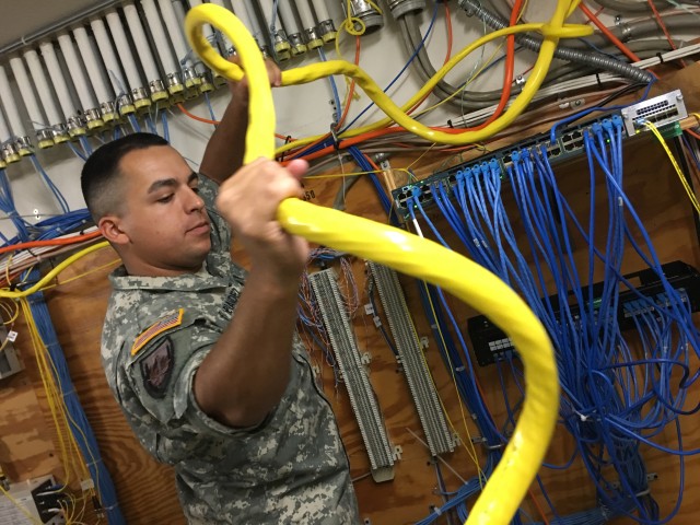 Reserve Signal Soldiers save big dollars installing communication cables