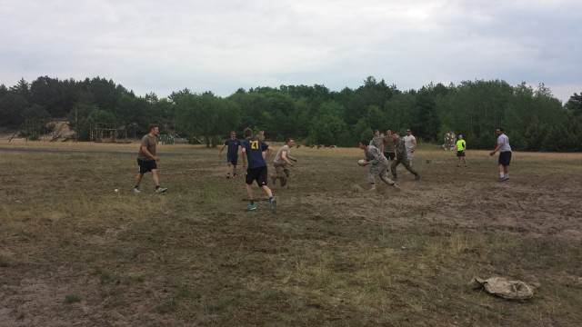 Soldiers from 5-7 ADA BN and the 19th Tk Tptr Sqn Playing Rugby