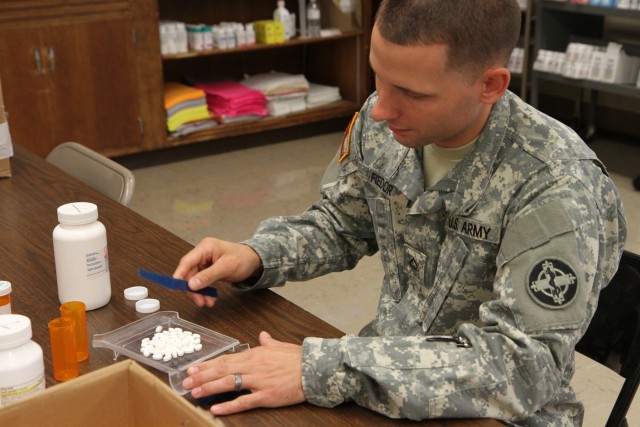 Pharmacy technician fills prescriptions during Greater Chenango Cares IRT