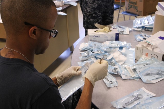 Service member prepares the Dental Clinic for IRT event in Cortland, NY.