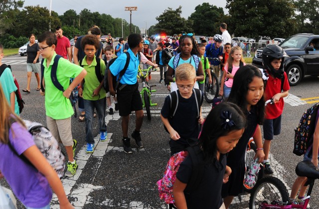 Back to school: Officials urge caution as children return to class