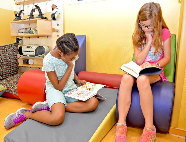 Literacy partnership promotes reading at School Age Centers