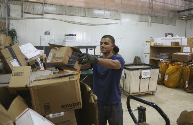 Soldier sorts mail in Jordan