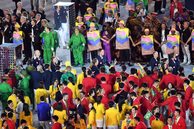 Staff Sgt. Joshua Richmond walks during 2016 Rio Olympic Games opening ceremony