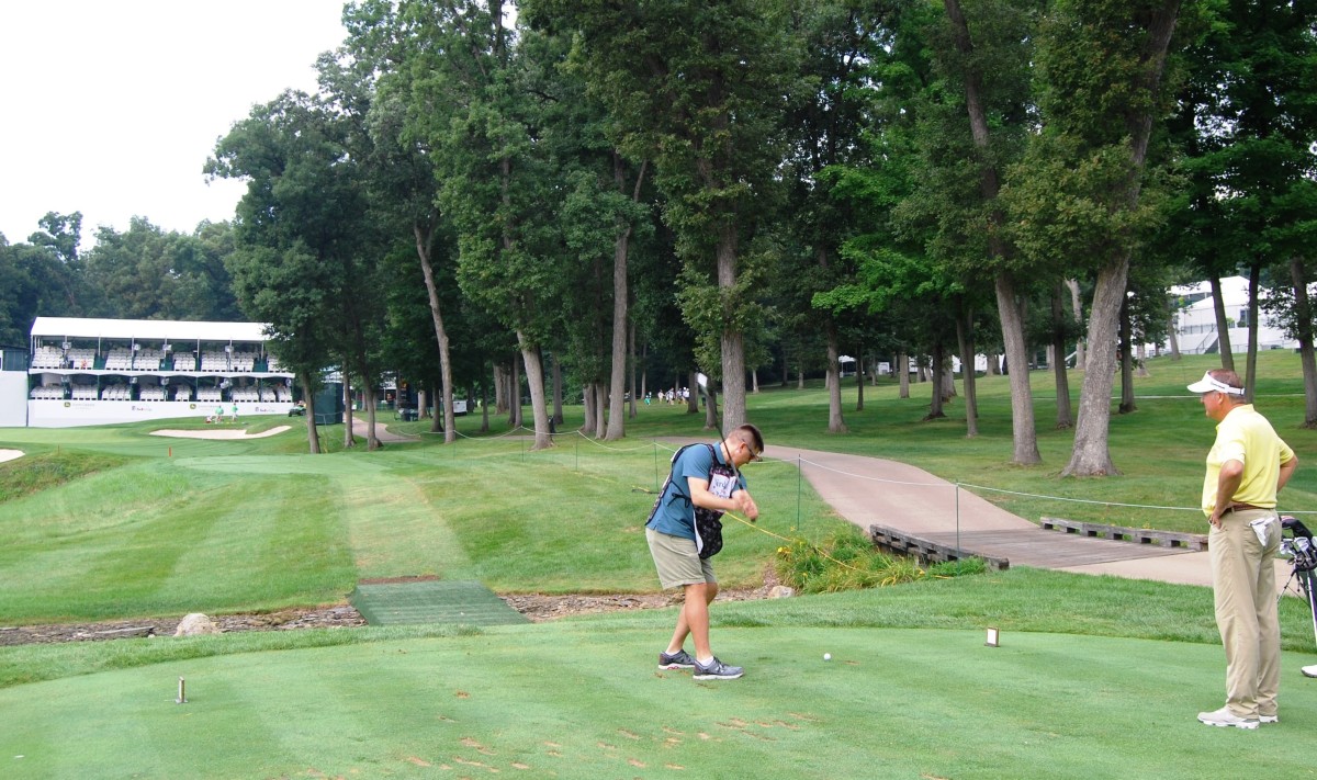 ASC Soldiers serve as caddies for the pros at John Deere Classic golf