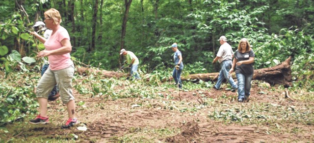 Fort Leonard Wood directorates team up to clean Happy Hollow 