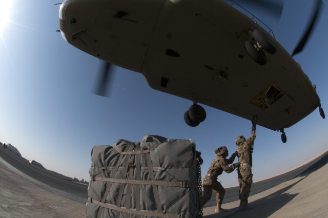 40th CAB practices night sling load movements at Camp Buehring, Kuwait