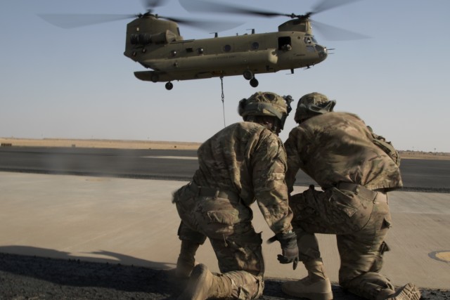 40th CAB practices night sling load movements at Camp Buehring, Kuwait