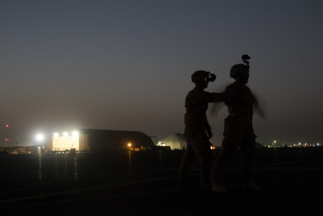 40th CAB practices night sling load movements at Camp Buehring, Kuwait