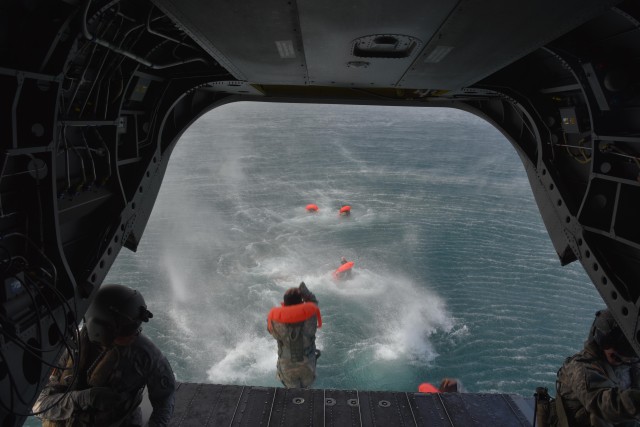 In case of an emergency standup and exit the helicopter