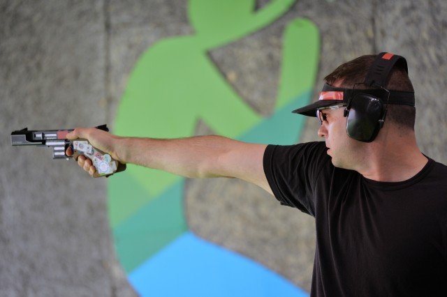 Sgt. 1st Class Keith Sanderson shoots rapid fire pistol in Rio Games