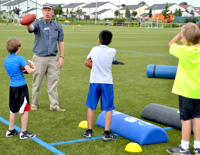 Youths learn basic skills, get in shape to stay safe during Youth Service Football Camps