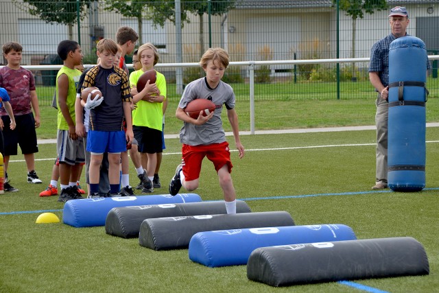 Youths learn basic skills, get in shape to stay safe during Youth Services Football Camps