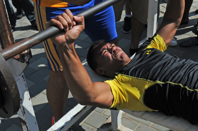 American servicemembers participate in friendly strongman competition