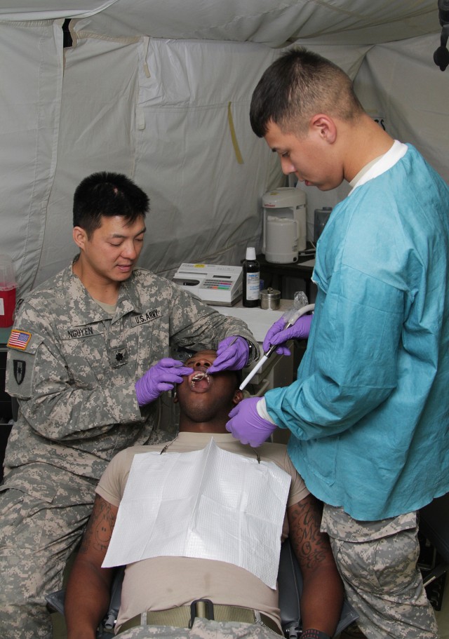 Army Reserve dental specialist refine skills in field operations