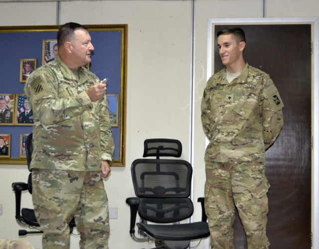 INSCOM Presents Command Coin to Worthy Soldier