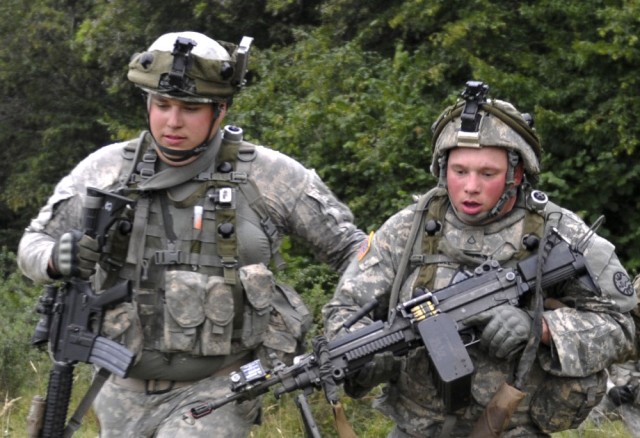 Army Spc. Kyle Herbst (left)