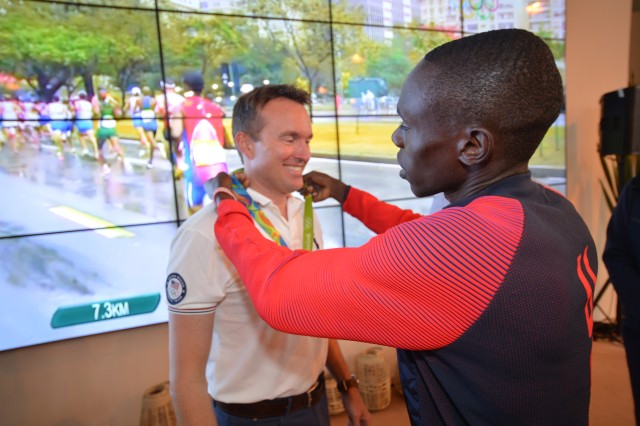 SPC Paul Chelimo shows his Silver
