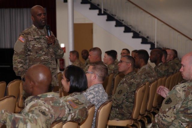 Command Sgt. Maj. Wardell Jefferson addresses the enlisted Soldiers from the KMC