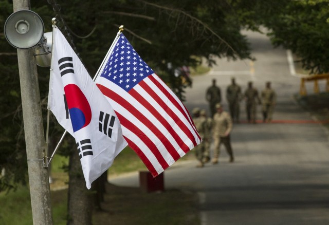 American and South Korean flags at Yongin