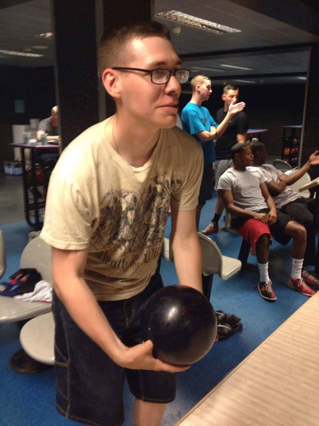 Spc. George Kallas prepares to demonstrate his bowling prowess