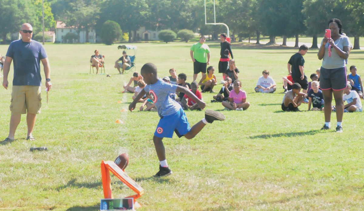 Children shine at Punt, Pass and Kick competition Article The