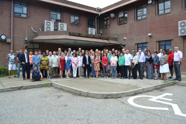 Yongsan school faculty members welcome new students and parents