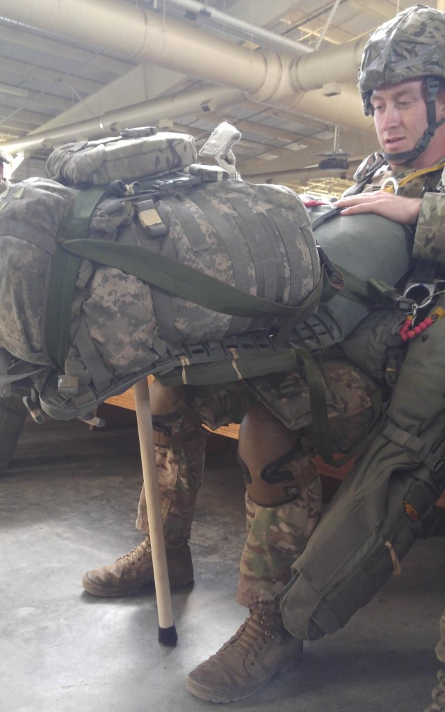 Soldier uses Low-Cost Airborne Soldier Load Assistance Device