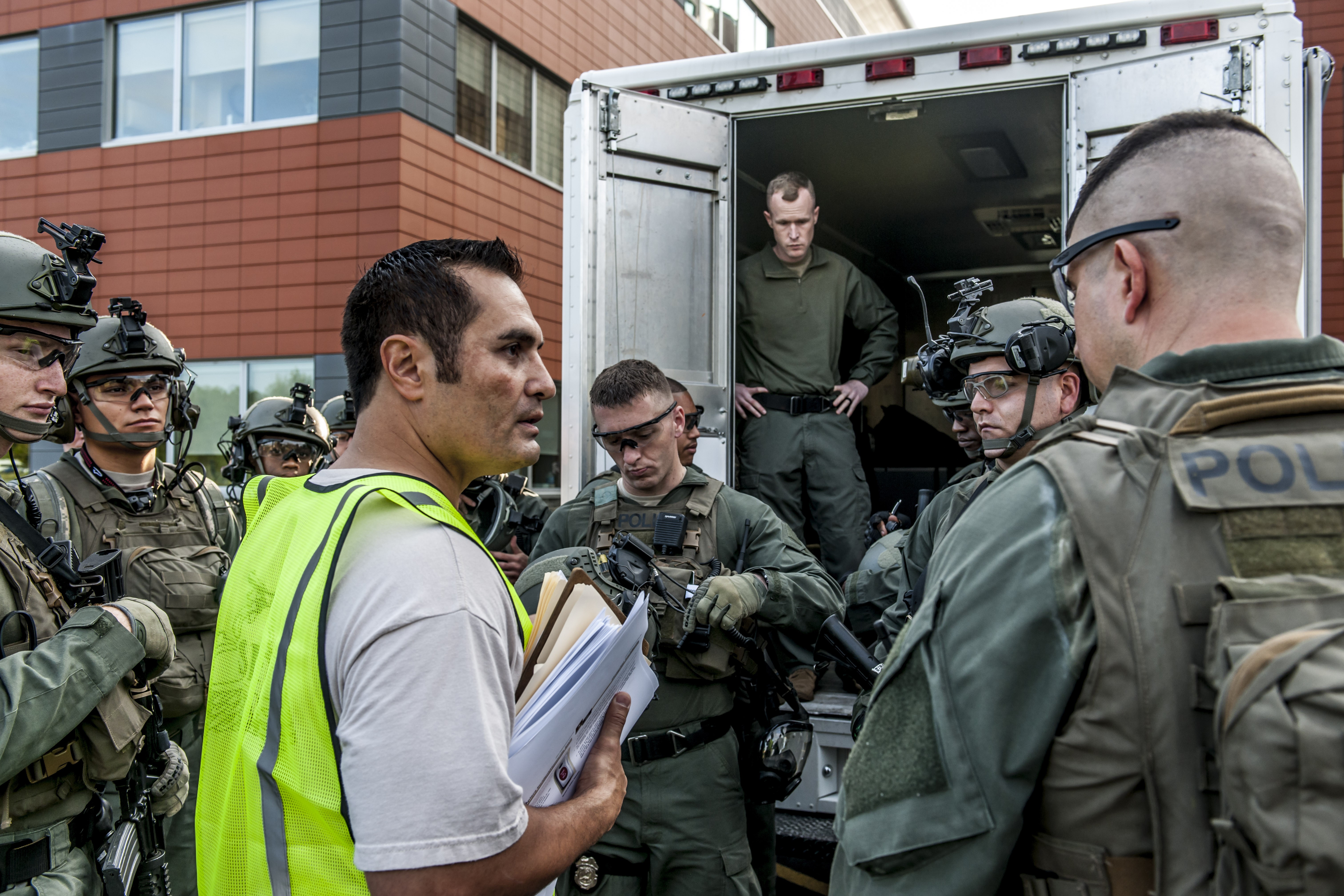 Hospital, emergency personnel drill for active shooter, mass