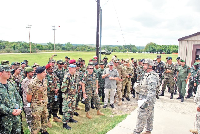 International officers of the International Military Student Division at Fort Leavenworth, Kansas, receive briefing at Fort Riley, Kansas Sept. 7