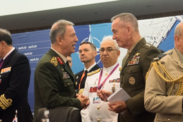 Turkey's chief of defense, Gen. Hulusi Akar, and Marine Corps Gen. Joe Dunford