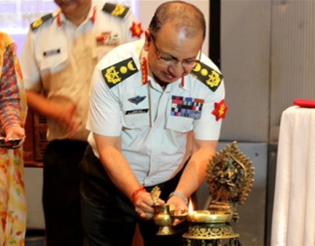 Chief of army staff, Nepal, ceremoniously lights a traditional Nepalese lantern