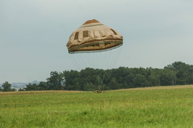 Skies open up with French and American Paratroopers during Colibri