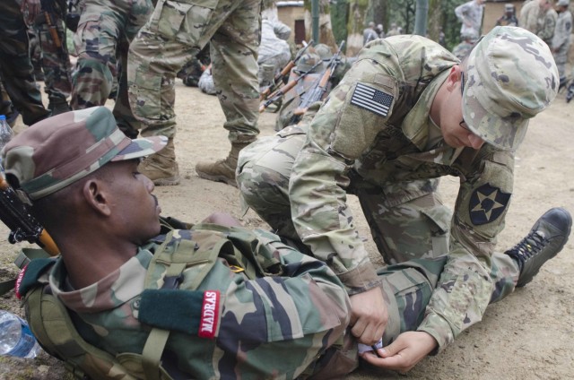 Soldiers with 5-20th Inf. Reg. conduct Field Trauma Management training in India