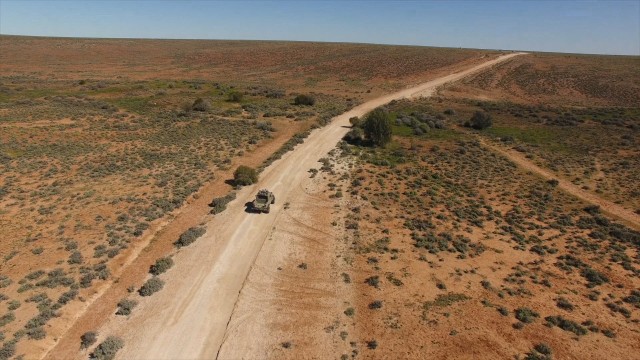 Using long-distance control, TARDEC tests robotic vehicle along challenging Australian terrain 