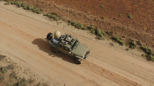 Using long-distance control, TARDEC tests robotic vehicle along challenging Australian terrain 