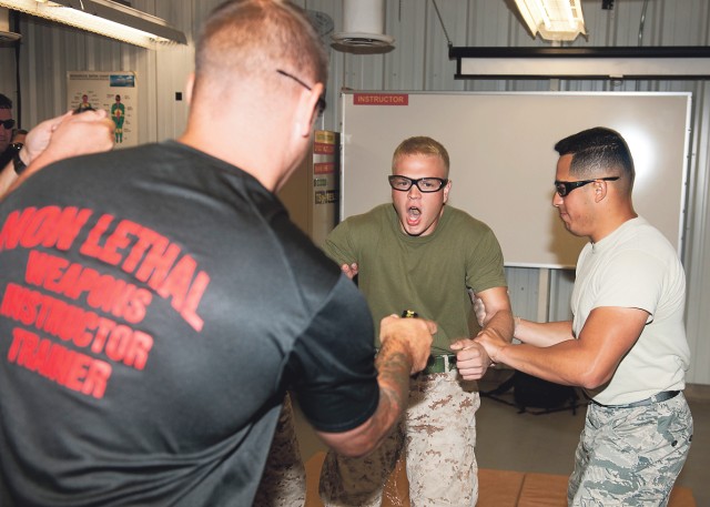 Tasing student instructors part of DOD nonlethal weapons course at Fort Leonard Wood