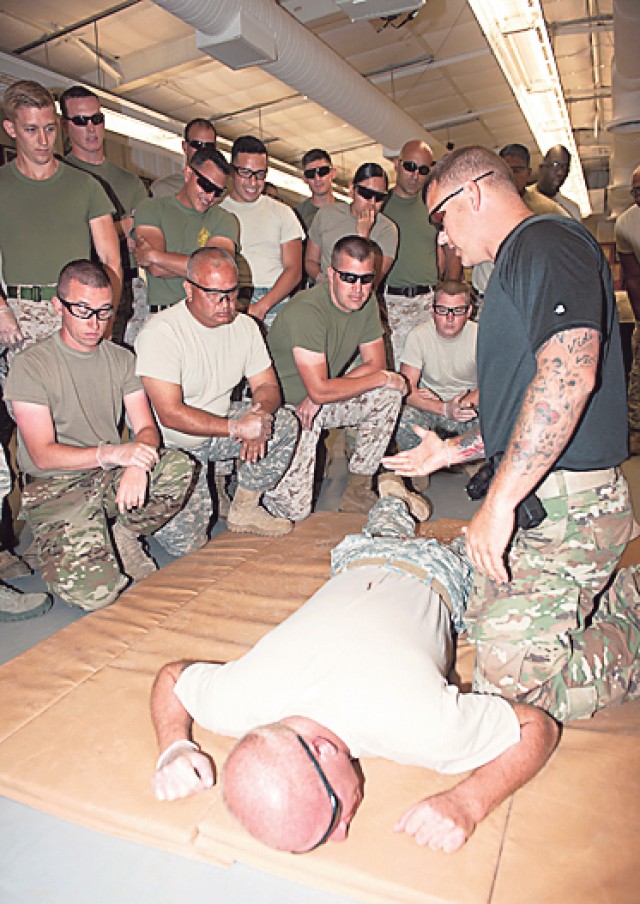 Tasing student instructors part of DOD nonlethal weapons course at Fort Leonard Wood