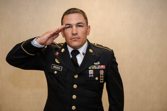Spc. Orozco renders a salute during the 2016 Best Warrior Competition Board