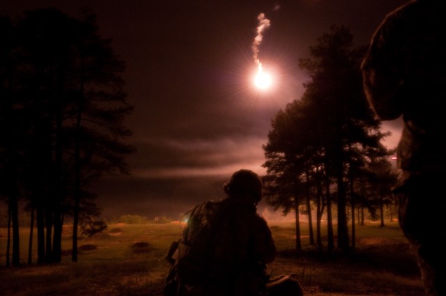 Spc. Orozco engages targets during night range qualification at the 2016 U.S. Army Reserve Best Warrior Competition