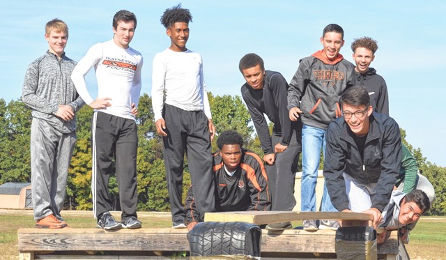 Army schools football players in teamwork on Fort Leonard Wood