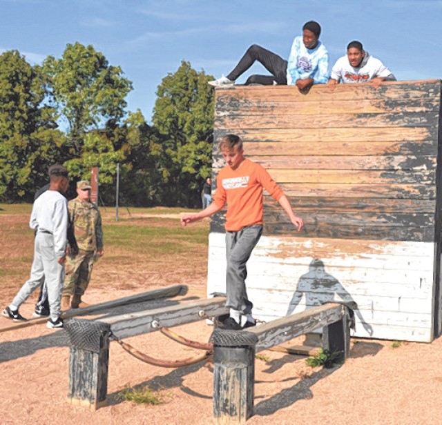 Army schools football players in teamwork on Fort Leonard Wood