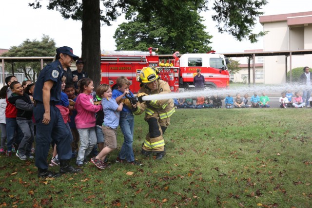 Camp Zama, SFHA youth get familiar with firefighters