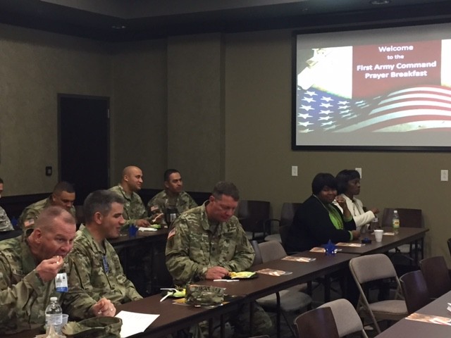 First Army Solciers and Civilians fellowship during the Prayer Breakfast hosted by the Unit Ministry Development Training held at Rock Island Arsenal, Illinois Oct. 19.