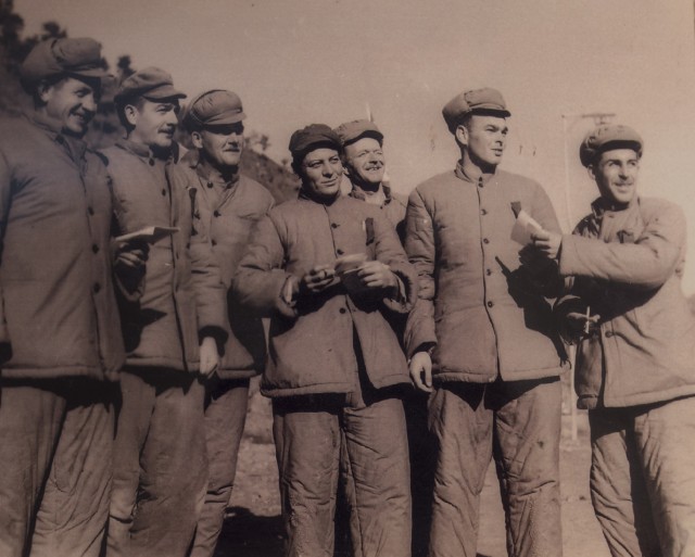 1st Lt. Bill Funchess and other POW's in the Pyoktang prison camp