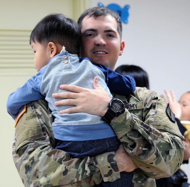 304th Expeditionary Signal Battalion Soldiers learn the joy of helping others