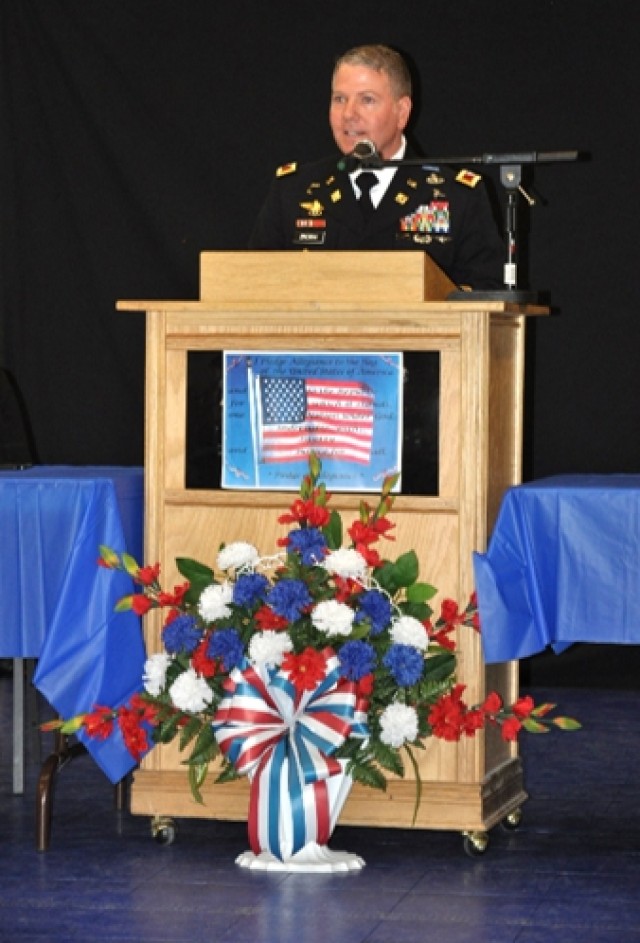 Colonel Jimmy Brown presenting Army remarks on Veteran's Day