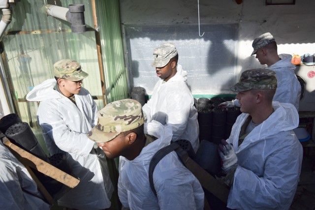 'Devil' brigade delivers coal to local Korean community