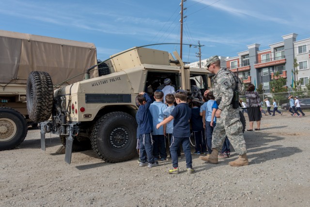 California military police welcomes youngsters during Vigilant Guard